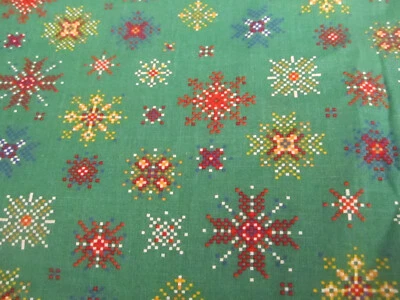 Cotton Fabric Joan Kessler CHRISTMAS Multicolored Snowflakes on Green BTYx44 - Image 1 of 4