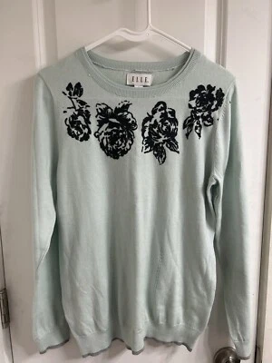 Suéter grande de mujer Elle cuello redondo negro con cuentas flor verde menta viscosa Foto 1 de 3