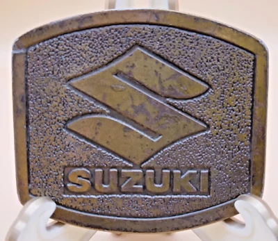 Hebilla de cinturón vintage Suzuki logotipo de motocicleta Koleaco Enterprises latón años 70 Foto 1 de 4