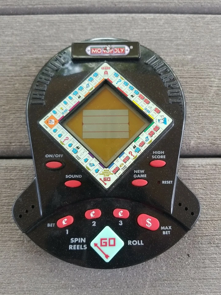 Monopoly Jackpot Juego de Máquina Tragamonedas de Casino Electrónico de Viaje de Mano 1999 Foto 1 de 1