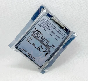 Toshiba 100GB MK1011GAH 1.8" CE hard drive for notebook/ IPOD/ Video camera. - Afbeelding 1 van 4