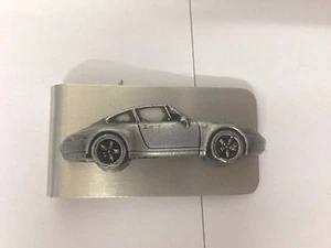 911 alemán alrededor de 1993 ref194 efecto peltre emblema de coche en un impresionante clip para dinero - Imagen 1 de 1
