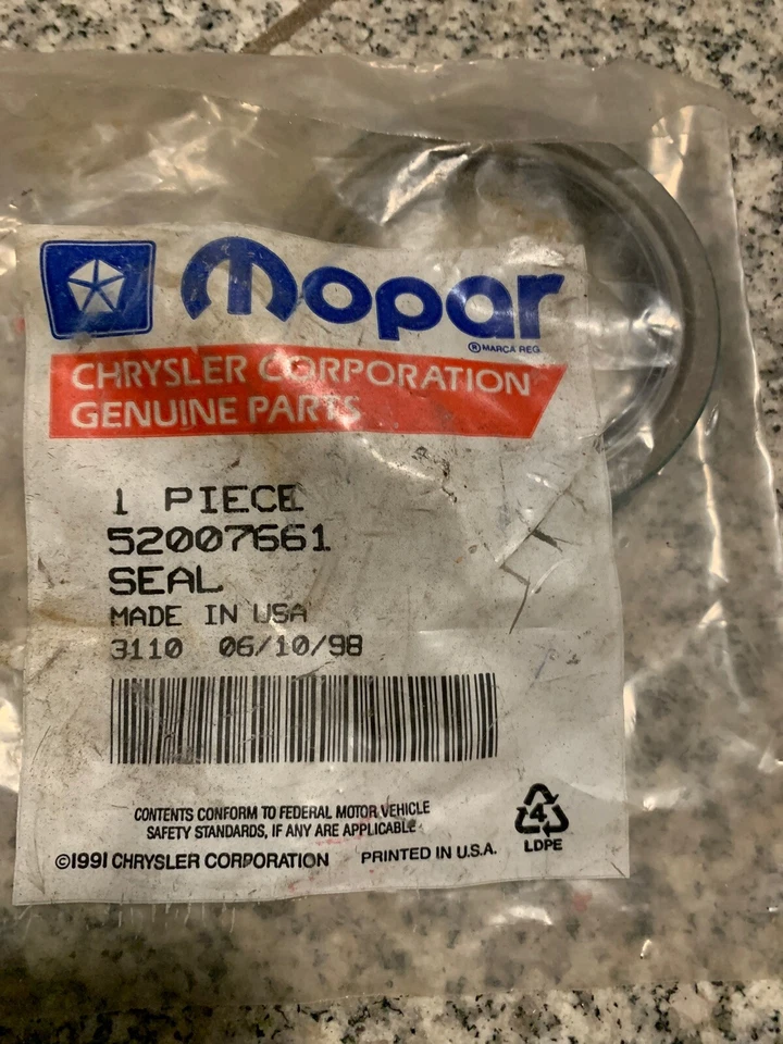 MOPAR OEM Wheel Seal for 1994-99 Dodge Ram 2500-52007661 New - Image 1 of 3
