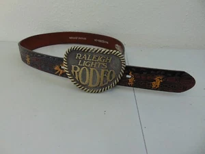 Nocona Belt & Raleigh Lights Rodeo Brass Buckle Bull Tooled Leather N4422002-24 - Picture 1 of 8