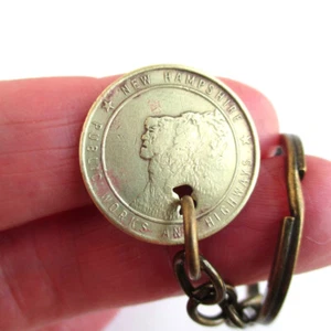 NEW HAMPSHIRE Transit Token Key Chain - Repurposed Vintage Gold NH Keychain - Picture 1 of 5