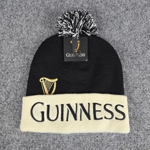 Guinness Bobbie Tejido Pom-Pom Sombrero Negro Blanco Puño Ala Gorro 100% Acrílico Nuevo con Etiquetas - Imagen 1 de 6