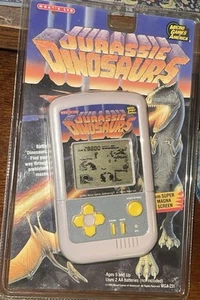 Jurassic Dinosaurs Handheld LCD Spiel 1993 MGA-231 Micro Games of America SEALED - Bild 1 von 3