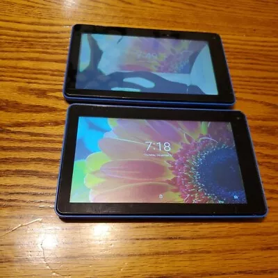 Lot of 2 RCA Voyager 7” Tablets, Black & Blue Both Power Up One W Damaged Screen - Image 1 of 4