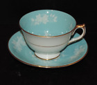 AYNSLEY TURQUOISE TEACUP AND SAUCER, ROSES & FORAL PATTERN