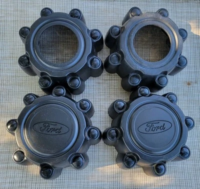 TAPAS CENTRALES FORD (4) NEGRAS F250 F350 EXCURSION 1999-2004 4X4 P#F81A1A096EA/FA Foto 1 de 4