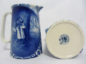 ROYAL STONE FLOW BLUE 5.5" JUG IN THE DESIGN OF HIDE AND SEEK - Picture 1 of 1