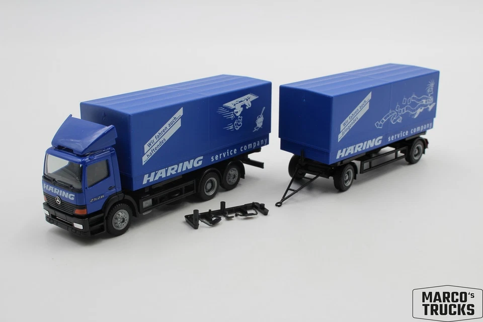 Herpa MB SK Atego 2528 swap-body drawbar truck "Spedition Häring" 1:87 /H25931 - Image 1 of 1