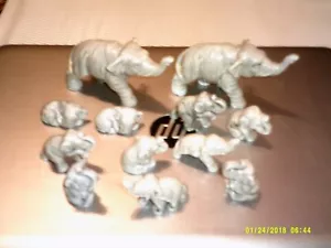 Herd Of Elephants Figurines 12 Pcs. 2 Large & 10 Babies Japan perfect condition. - Picture 1 of 8