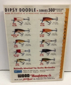 Señuelo de pesca Dipsy Doodle años 50 anuncio impreso tabla de colores en señuelos de pesca de madera - Imagen 1 de 2