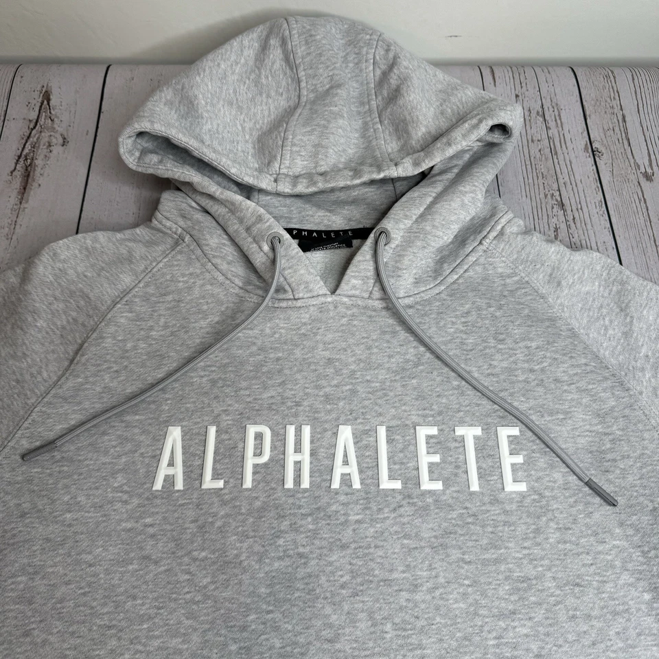 Толстовка с капюшоном Alphalete мужская средняя с надписью серый пуловер для тренировок - Изображение 1 из 4