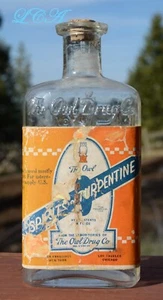 BOTELLA MÁS GRANDE antigua BÚHO DROGA con foto etiqueta BÚHO y ESPIRITUOS TREMENTINA - Imagen 1 de 3