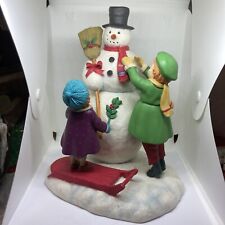 Hallmark Large Traditional Snowman Glitter figurine being built by children 9"