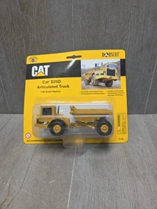 Norscot CAT Caterpillar D25D Die-Cast Articulated Truck 1/64 - NIB - Picture 1 of 2