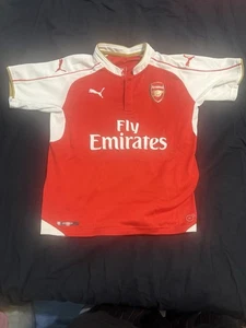 Camiseta local Arsenal FC 2016/17 juvenil talla mediana fútbol Puma Fly Emirates roja - Imagen 1 de 9