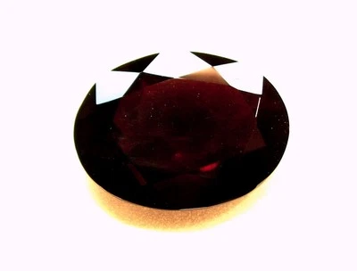 Natural  Mined Loose Gem 1 Piece Oval  Brown Garnet 17.52 Carats 19.9x15x7.3 MM - Image 1 of 4
