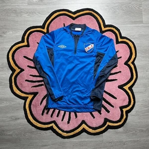 Top de Entrenamiento Umbro Club Nacional de Fútbol C.N.F Cuarto Cremallera Talla Pequeña Azul - Imagen 1 de 7