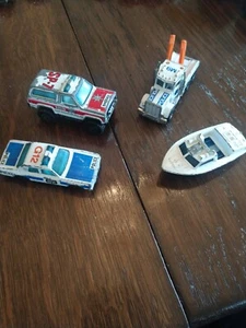 VINTAGE 70'S-80'S MATCHBOX POLICE LOT PLYMOUTH, TOW, BLAZER AND BOAT - Bild 1 von 22