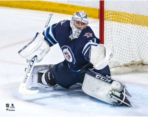 Connor Hellebuyck Winnipeg Jets Unsigned Blue Jersey Glove Save 11" x 14" Photo Cover