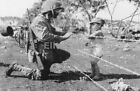 WW2 Photo US Marine with M1 Carbine gives candy to a child Tinian 1944 WWII 087