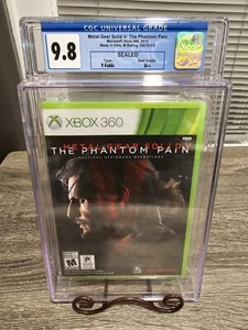 Metal Gear Solid V: The Phantom Pain - Xbox 360 - SEALED - CGC 9.8 A++ Graded - Picture 1 of 8