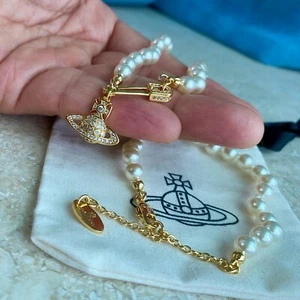 Vivienne Westwood Lucrece Pearl Necklace Gold Safety Pin Orb Pendant - Imagen 1 de 2