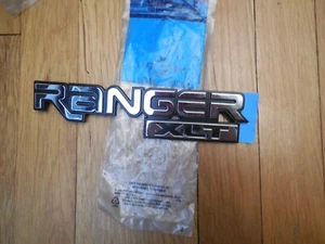 Nuevo de lote antiguo 1993-2005 emblema guardabarros delantero Ford Ranger XLT F67Z-16720-A - Imagen 1 de 2