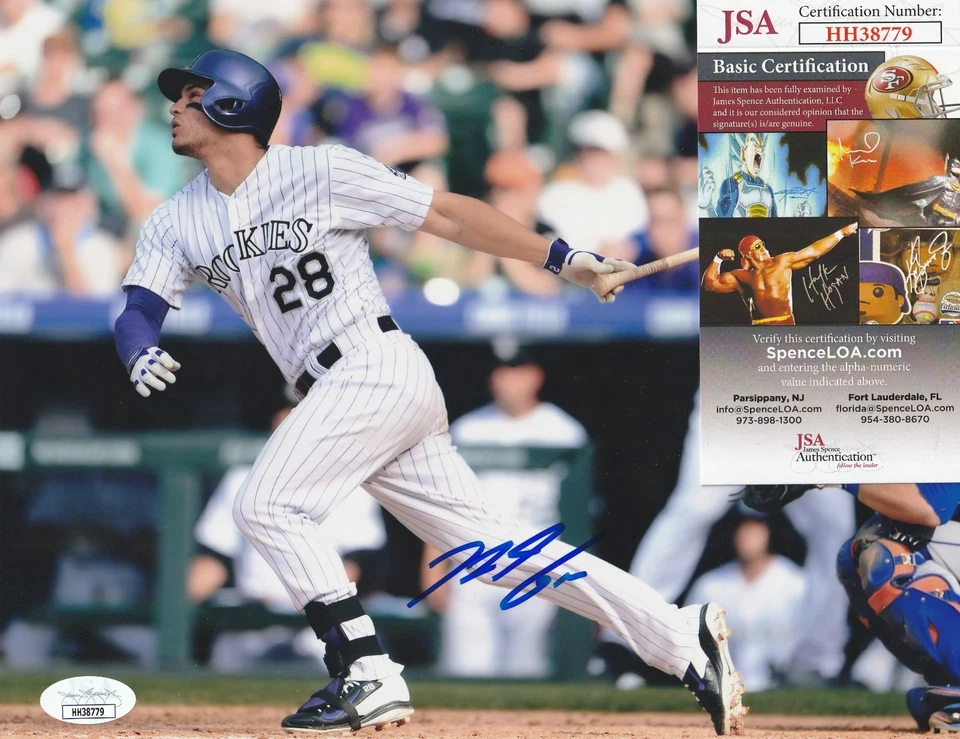 NOLAN ARENADO COLORADO ROCKIES  JSA AUTHENTICATED  ACTION SIGNED 8x10 - Image 1 of 1