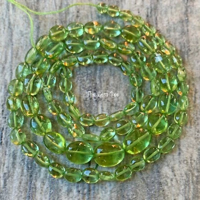 Cuentas pepita ovaladas lisas de turmalina verde primavera gema hebra de 16 pulgadas Foto 1 de 4