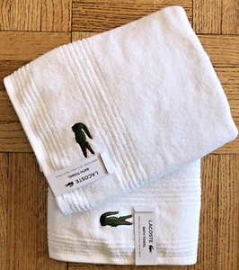 Set asciugamani bagno Lacoste 2 pezzi lusso cotone bianco con logo coccodrillo 30 x 52 nuovi con etichette! - Foto 1 di 6