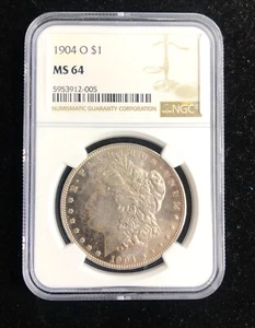 1904 O 1$ Morgan Silver Dollar NGC MS64 Gold Toned - Picture 1 of 3