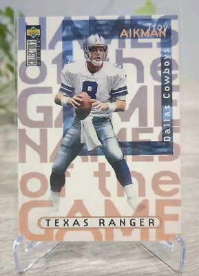 1997 Upper Deck Collector's Choice Names of the Game Troy Aikman Texas Ranger 60 - Image 1 of 2