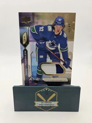 Vasily Podkolzin 2021-22 UD Premier Rookie Gold Patch Card 47/49 - Image 1 of 3