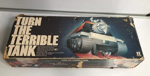 Juego de juguete Tomy Turn The Terrible Tank 1979 vintage con caja original - Imagen 1 de 14