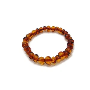 BRACCIALE AMBRA BALTICA NATURALE BAMBINO COGNAC PICCOLA CASSAFORTE IN GOMMA - Foto 1 di 3