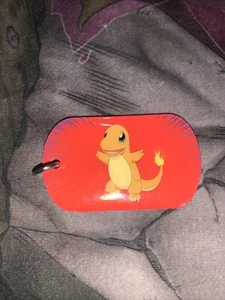 Vintage 1999 Nintendo Charmander Schlüsselanhänger Dog Tag - Bild 1 von 1