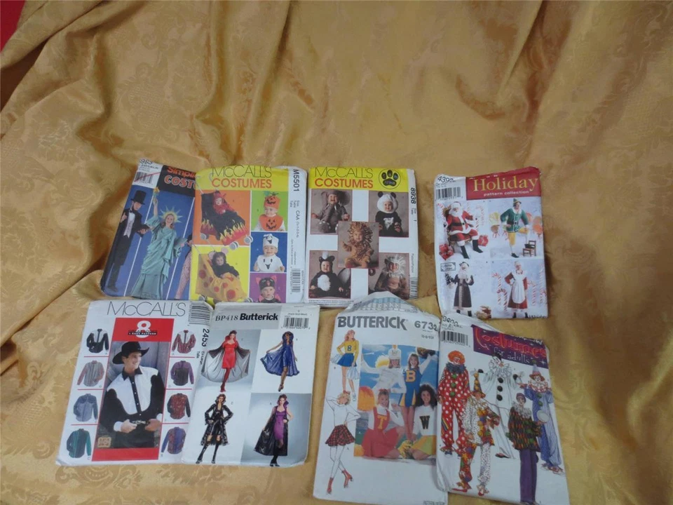 7 New Halloween Costumes Adult & Baby -Clowns-Vamp-Cheerleader-Animals-Santa - Image 1 of 1