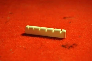 PLASTIC STEEL STRING GUITAR HEAD SADDLE - Picture 1 of 5