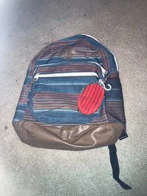 Mochila Dickies a Rayas Rojo/Azul/Marrón/Blanco - Estilo Clásico Foto 1 de 4