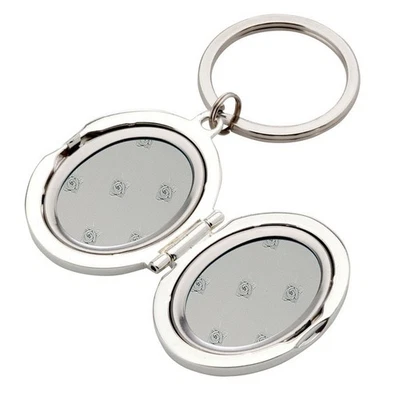 H.BAUER JUN. klappbarer versilberter Schlüsselanhänger als Medaillon für 2 Fotos