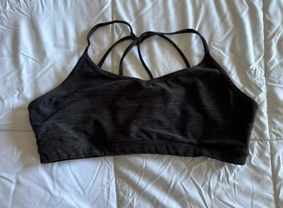 Sujetador deportivo Lole Half Moon, negro, para mujer medio elástico gimnasio entrenamiento usado en excelente estado Foto 1 de 4