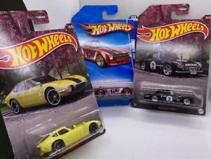HOT WHEELS HOT WHEELS - DATSUN / TRIUMPH / TOYOTA - Picture 1 of 7