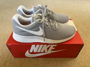 grey nike tanjun trainers