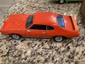 ERTL AMERICAN MUSCLE 1:18 ‘69 GTO RAM AIR THE JUDGE Diecast - Picture 1 of 6