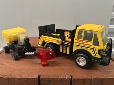 Camión de emergencia vintage Remco Toys EPG amarillo 1993 China plástico de acero prensado Foto 1 de 4