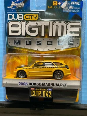1/64 JADA DUB CITY BIGTIME MUSCLE 2006 DODGE MAGNUM R/T YELLOW AND BLACK - Image 1 of 2